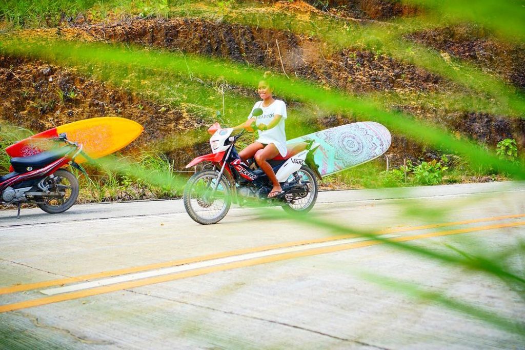 Scooter with surfboard rack near Cloud 9
